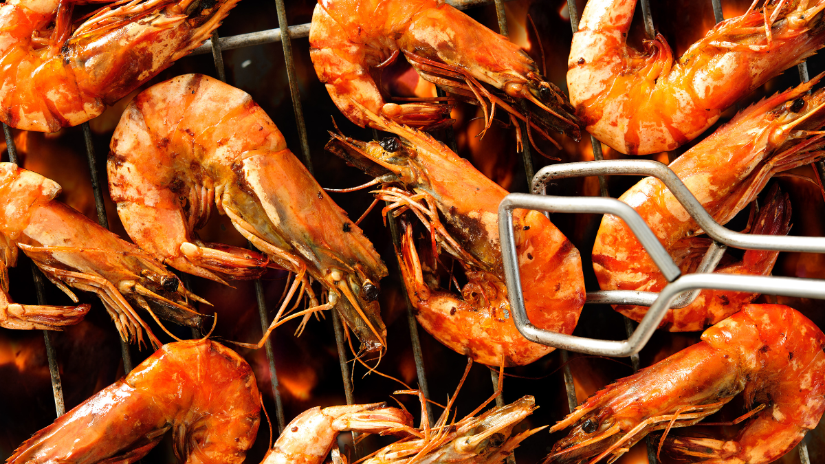 Piri piri prawns on a charcoal grill